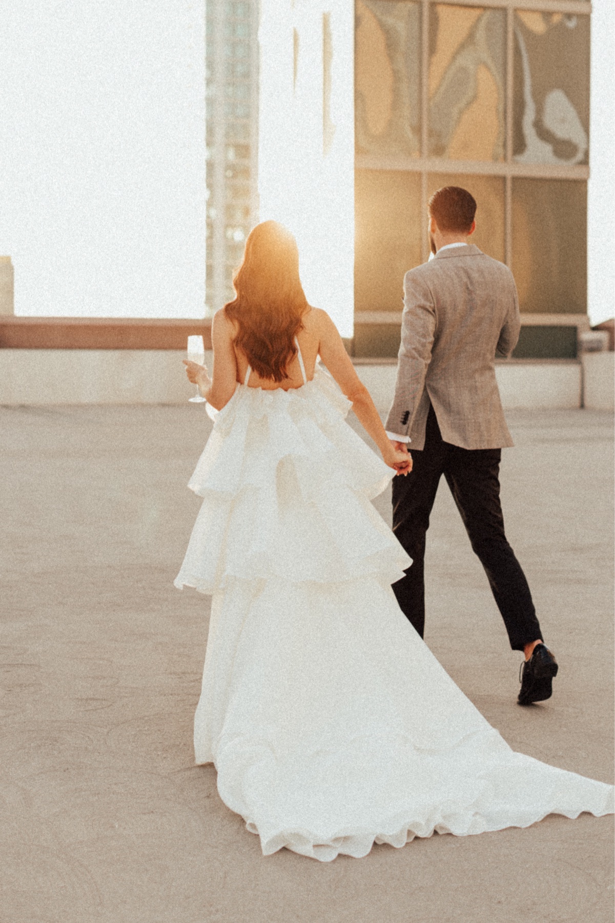 bride and groom walking to san diego wedding reception